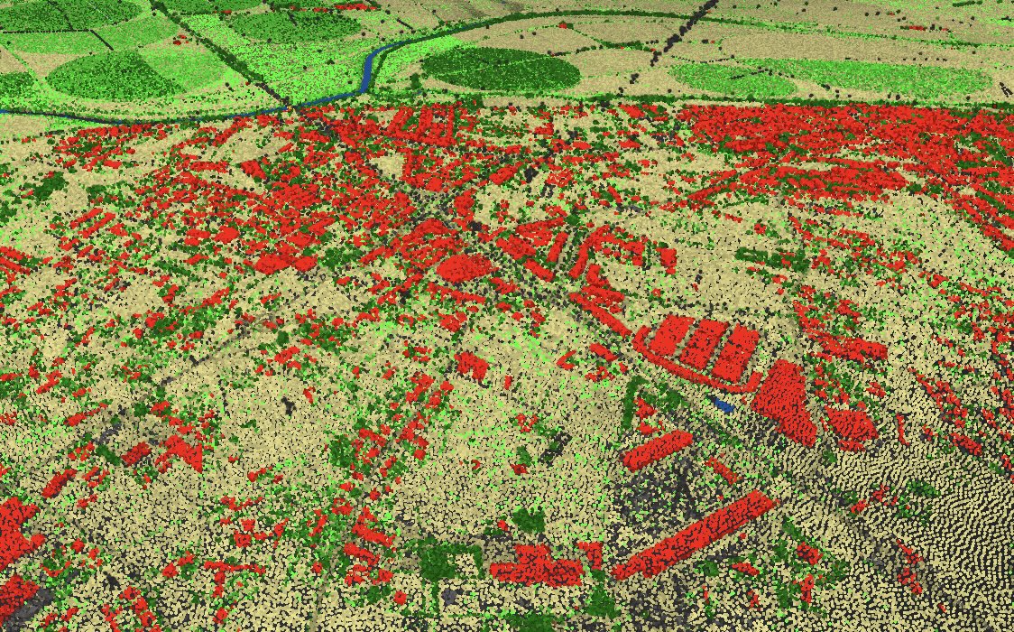 Visualização LiDAR do território, representada por uma nuvem de pontos colorida, evidenciando relevo, vegetação e estruturas edificadas.